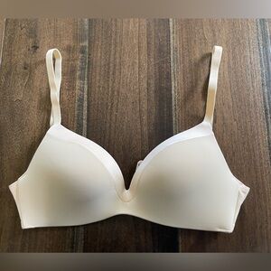 NWOT but with original packaging. Unused Underoutfit bra size S.